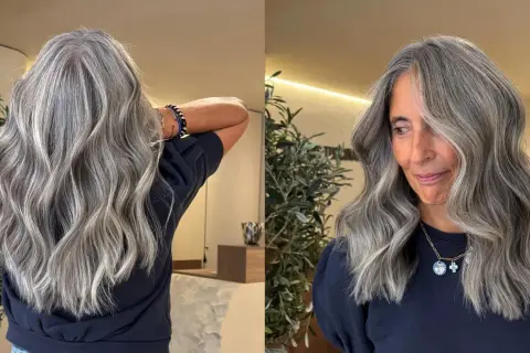 Magnifique coloration sur cheveux gris, avec des reflets argentés et des ondulations douces. Une allure élégante et moderne.