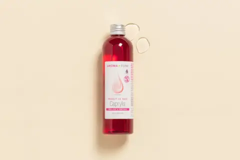Flacon de Caprylis, un produit de base Aroma-Zone, idéal pour la douceur et la pénétration, parfait pour les soins des cheveux comme la glycérine végétale.
