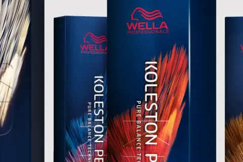 Trois boîtes de coloration Wella Koleston Perfect, avec des motifs abstraits de plumes dorées et rouges. Le mode d'emploi est intégré au design.
