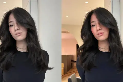 Une jeune femme aux cheveux bruns et ondulés, un look brillant et soigné. Ce style, c'est ce qu'est un gloss en coiffure : une touche d'éclat pour sublimer la chevelure.