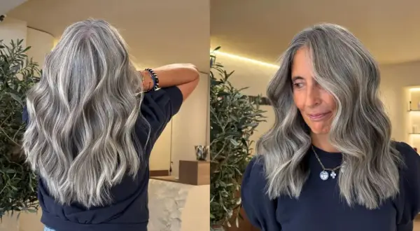 Magnifique balayage sur cheveux poivre et sel, des mèches argentées et grises se fondent avec élégance.