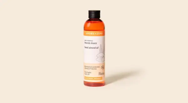 Bouteille d'huile amande douce Aroma-Zone, idéale pour les cheveux et peaux fragiles. Douceur et protection naturelles.