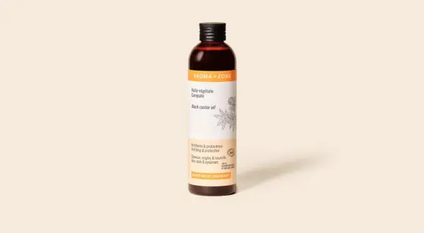 Flacon d'huile végétale Carapate Aroma-Zone, idéale pour les bienfaits sur les cheveux, ongles et sourcils.