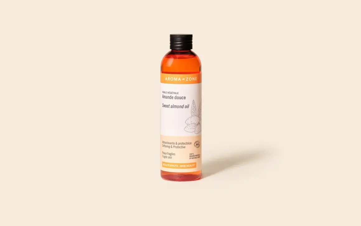 Bouteille d'huile amande douce Aroma-Zone, idéale pour les cheveux et peaux fragiles. Douceur et protection naturelles.