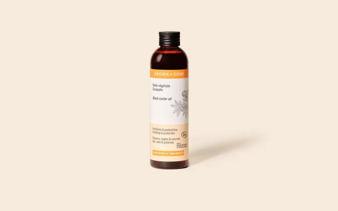 Flacon d'huile végétale Carapate Aroma-Zone, idéale pour les bienfaits sur les cheveux, ongles et sourcils.