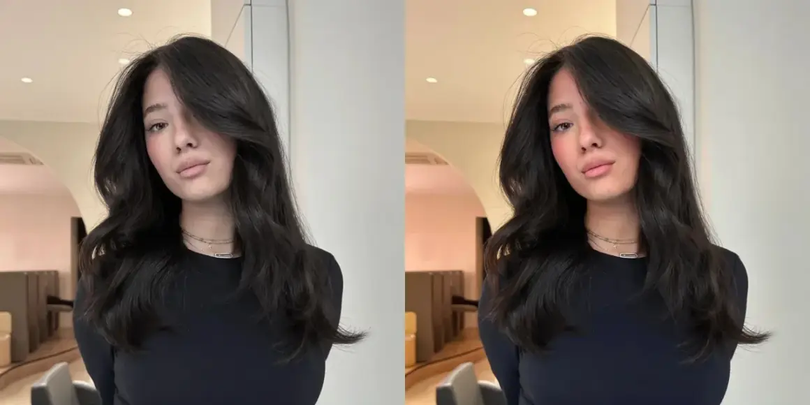 Une jeune femme aux cheveux bruns et ondulés, un look brillant et soigné. Ce style, c'est ce qu'est un gloss en coiffure : une touche d'éclat pour sublimer la chevelure.