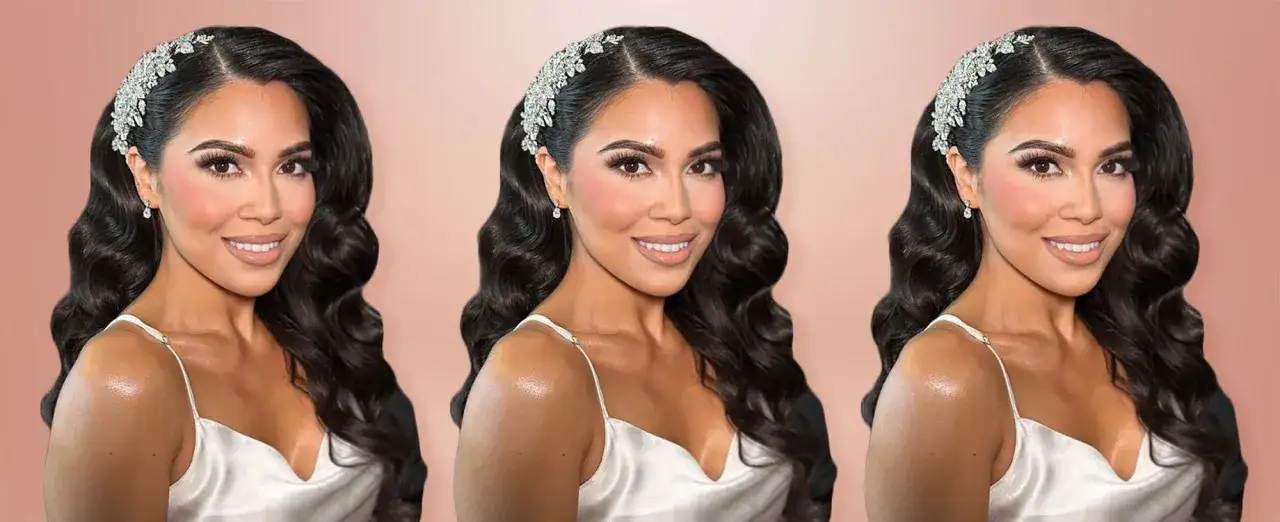 Une femme aux cheveux ondul&eacute;s sombres porte un diad&egrave;me scintillant. Sa coiffure qui tient plusieurs jours est parfaite pour un mariage ou un &eacute;v&eacute;nement sp&eacute;cial.